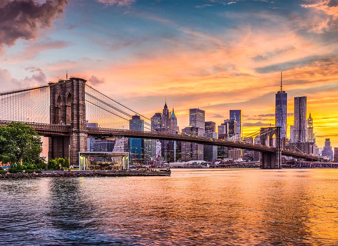 Contact - Scenic View of the New York City Skyline During Sunset